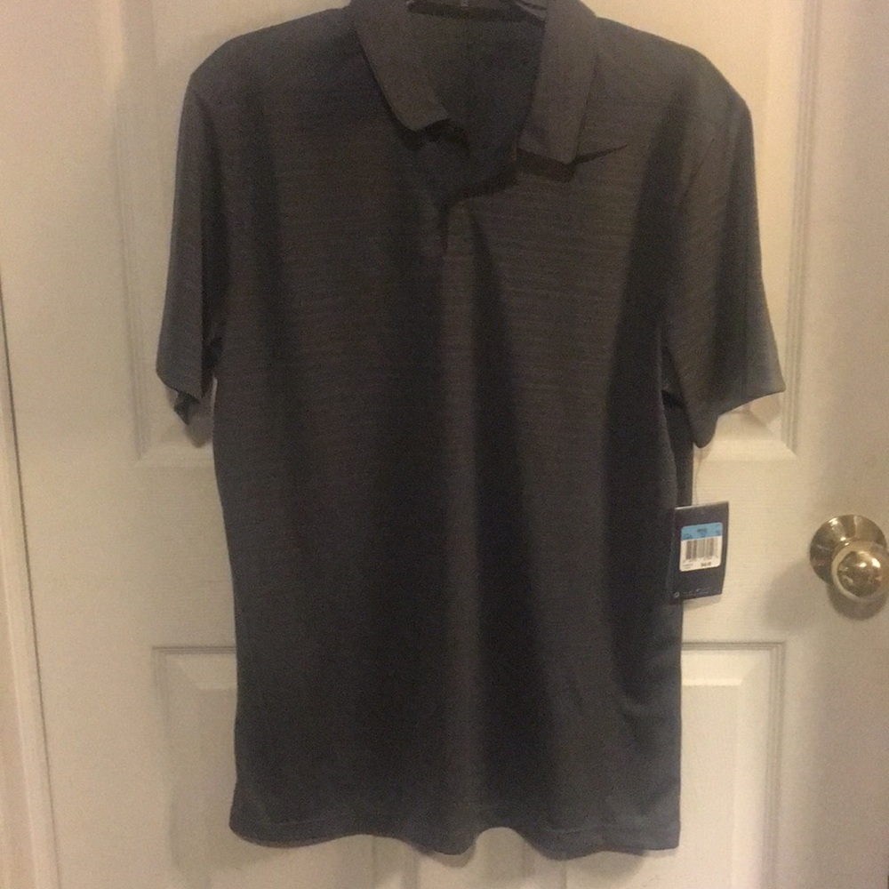 Tags on Nike men’s golf polo!